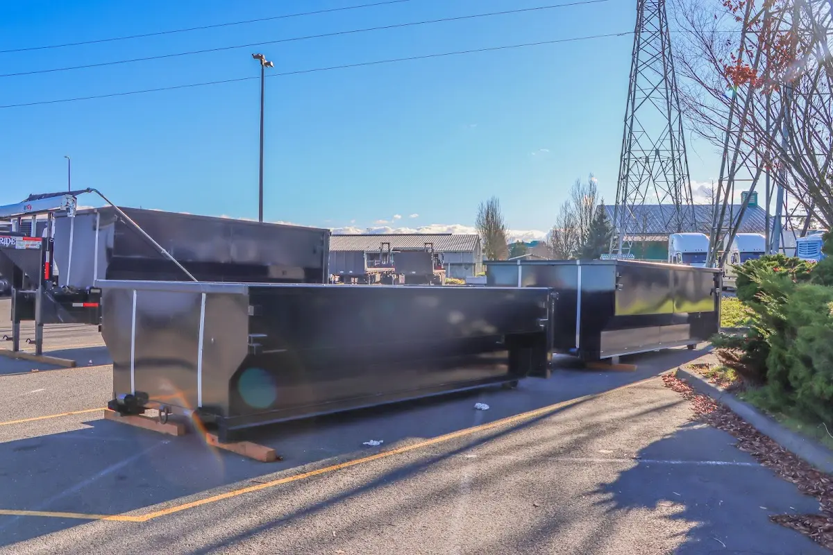 Roll-off dumpster ready for waste disposal at job site for Demolition Dumpster Rental in Redding